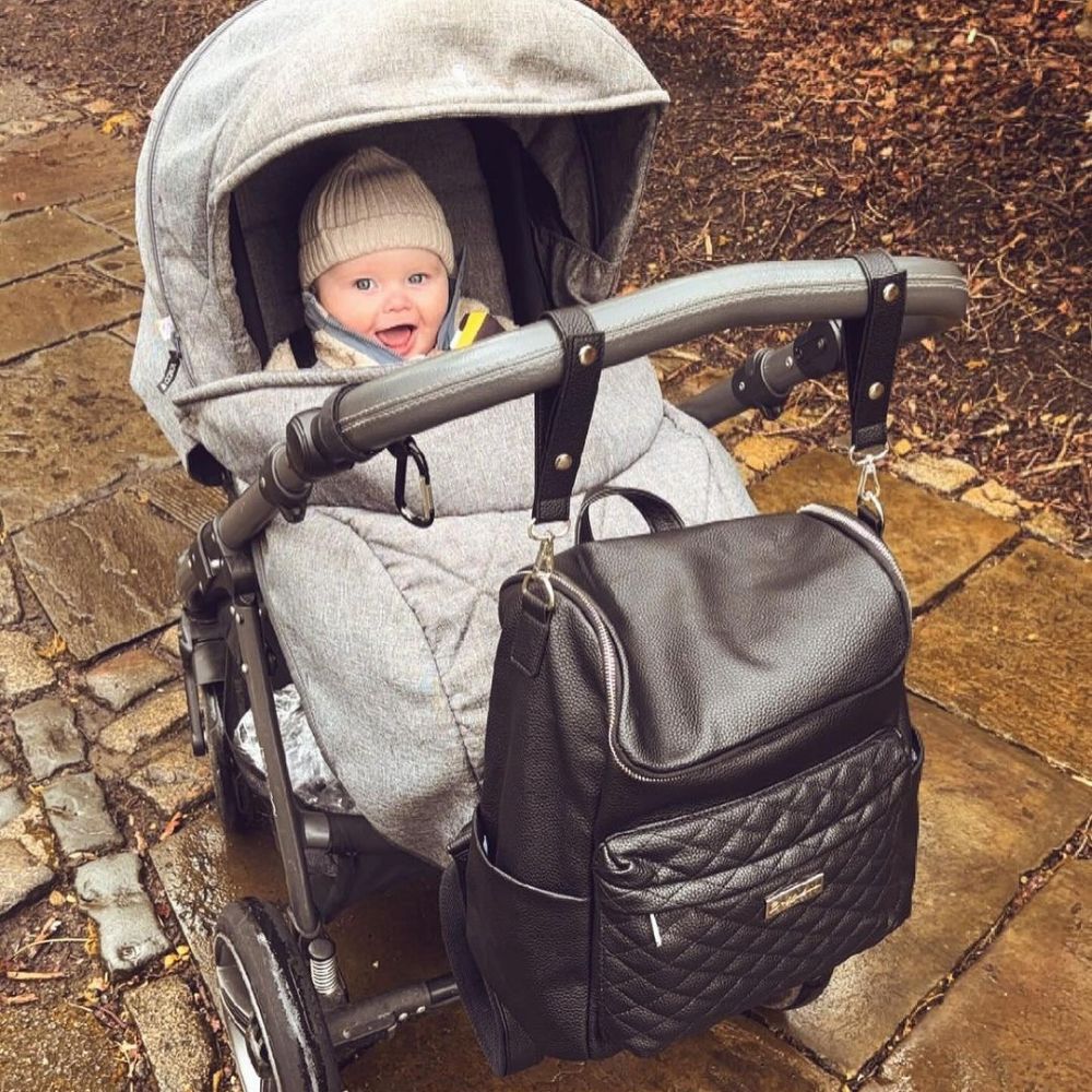 Bellaboo Mabel Baby Changing Bag Onyx Black Worn On The Stroller Pram With A Baby