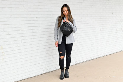 Bellaboo Crossbody Baby Sling Caddy Bag Onyx Worn By A Mum
